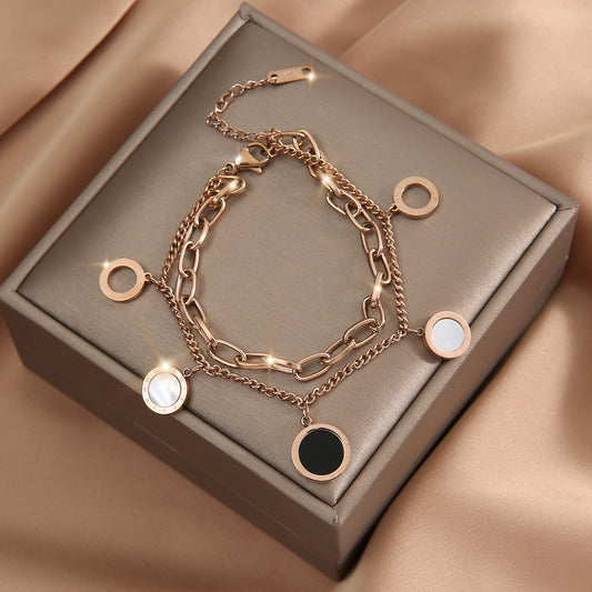 Golden Essence Roman numeral pendant bracelet, adding a touch of light luxury and timeless elegance to any outfit. #RomanNumeralBracelet #LightLuxury #GoldenEssence #TimelessElegance #FashionJewelry #LuxuryAccessories #PendantBracelet #ChicStyle