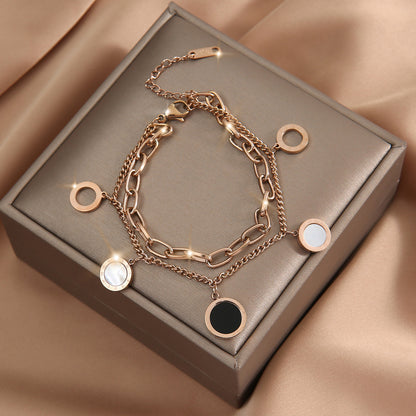 Golden Essence Roman numeral pendant bracelet, adding a touch of light luxury and timeless elegance to any outfit. #RomanNumeralBracelet #LightLuxury #GoldenEssence #TimelessElegance #FashionJewelry #LuxuryAccessories #PendantBracelet #ChicStyle