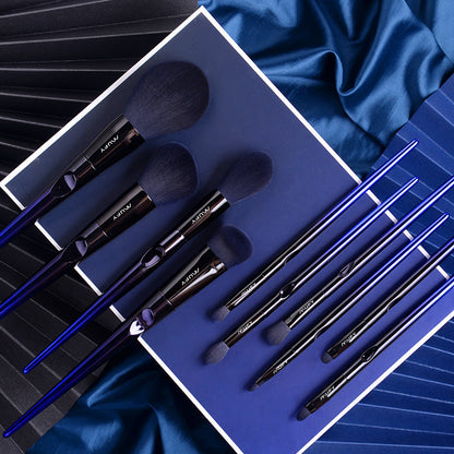 Blue 10-piece makeup brush set featuring soft nylon wool bristles, plastic handles, and a stylish gift box or envelope package, perfect for professional and everyday use.