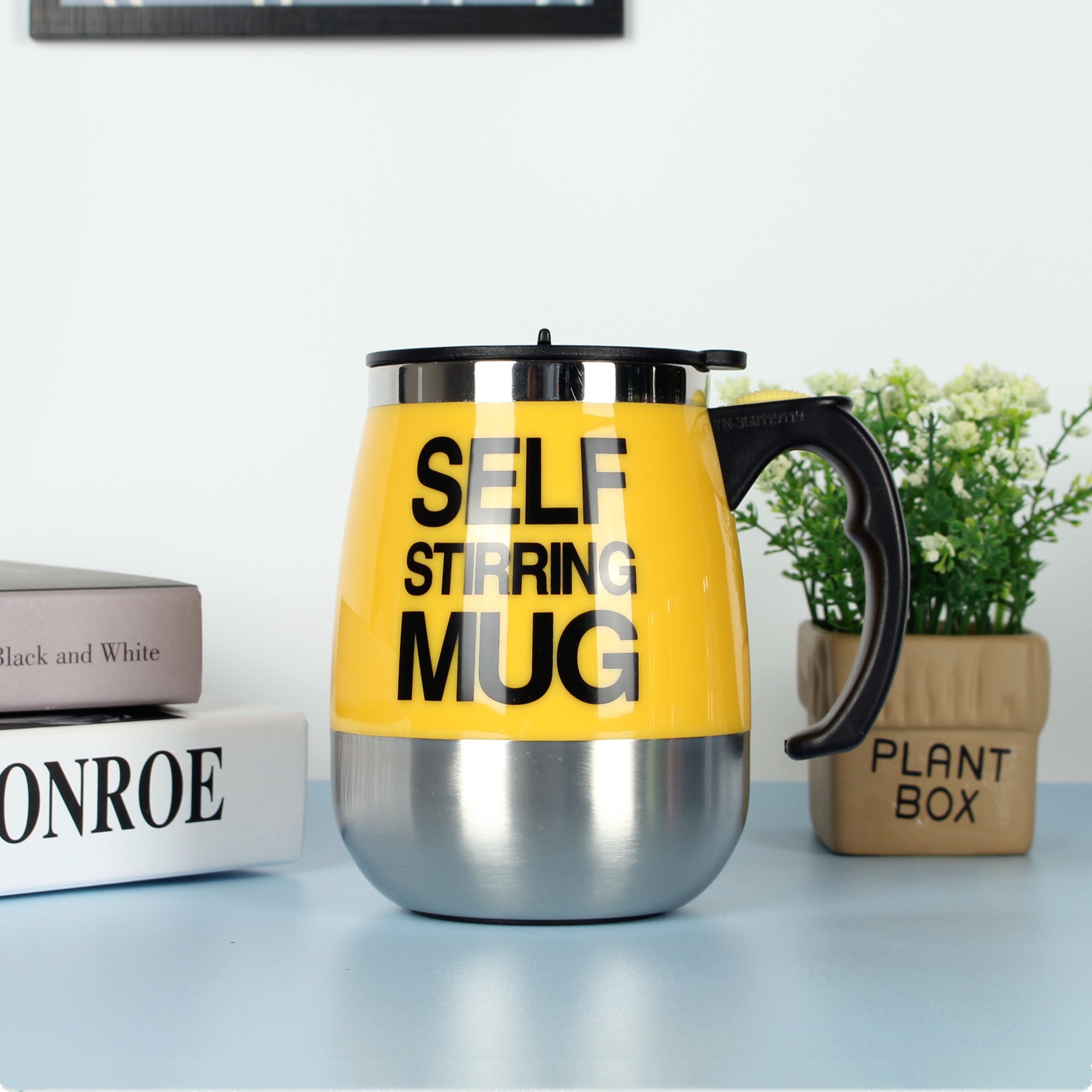 "Electric Self-Stirring Coffee Mug – A convenient, one-touch self-mixing mug with a 401-500ml capacity, available in multiple vibrant colors. Perfect for coffee, tea, and hot chocolate lovers at home or on the go."