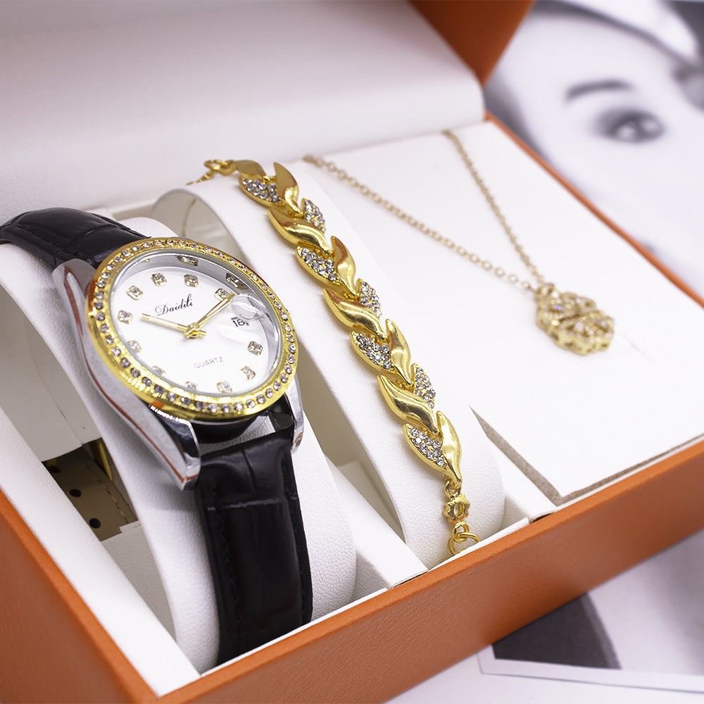 Elegant women's three-piece gift set featuring a luminous quartz watch, a necklace, and a bracelet. The set includes stylish accessories with a horseshoe buckle, alloy case, and imitation leather strap. Perfect for gifting!
