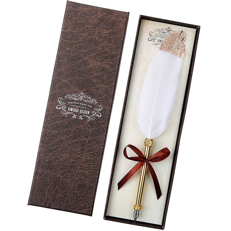 **Elegant Retro Feather Pen Gift Set – Vintage Writing Experience**  

A beautifully crafted **stainless steel feather pen** set in a stylish **gift box**, perfect for writers, calligraphy enthusiasts, and collectors. Timeless design meets smooth writing for an unforgettable experience. Ideal for gifting on any occasion! 🎁✒️