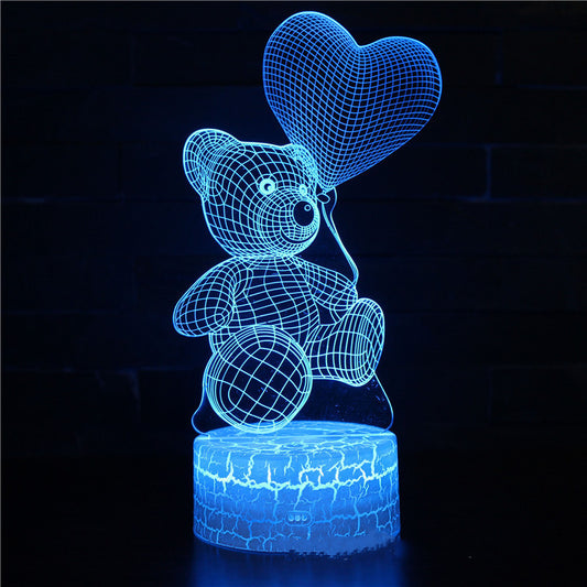 
3D Teddy Bear LED Night Light with 16 color options, touch and remote control, made from acrylic material. Powered by USB or batteries, perfect for kids' room decor.