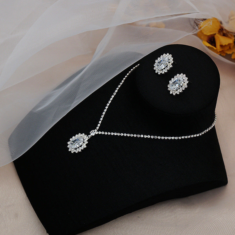 Water Drop Necklace and Earrings Set – Elegant alloy set featuring rhinestone pendant and gold-plated artificial gems. Perfect for weddings, travel souvenirs, and special gifts