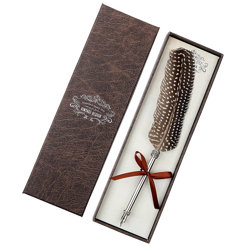 **Elegant Retro Feather Pen Gift Set – Vintage Writing Experience**  

A beautifully crafted **stainless steel feather pen** set in a stylish **gift box**, perfect for writers, calligraphy enthusiasts, and collectors. Timeless design meets smooth writing for an unforgettable experience. Ideal for gifting on any occasion! 🎁✒️
