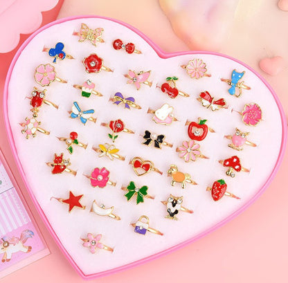 Birthday Gift for Little Girl featuring a Diamond Set Alloy Ring with 36 adjustable rings in a heart-shaped box. Perfect for encouraging creativity and style!