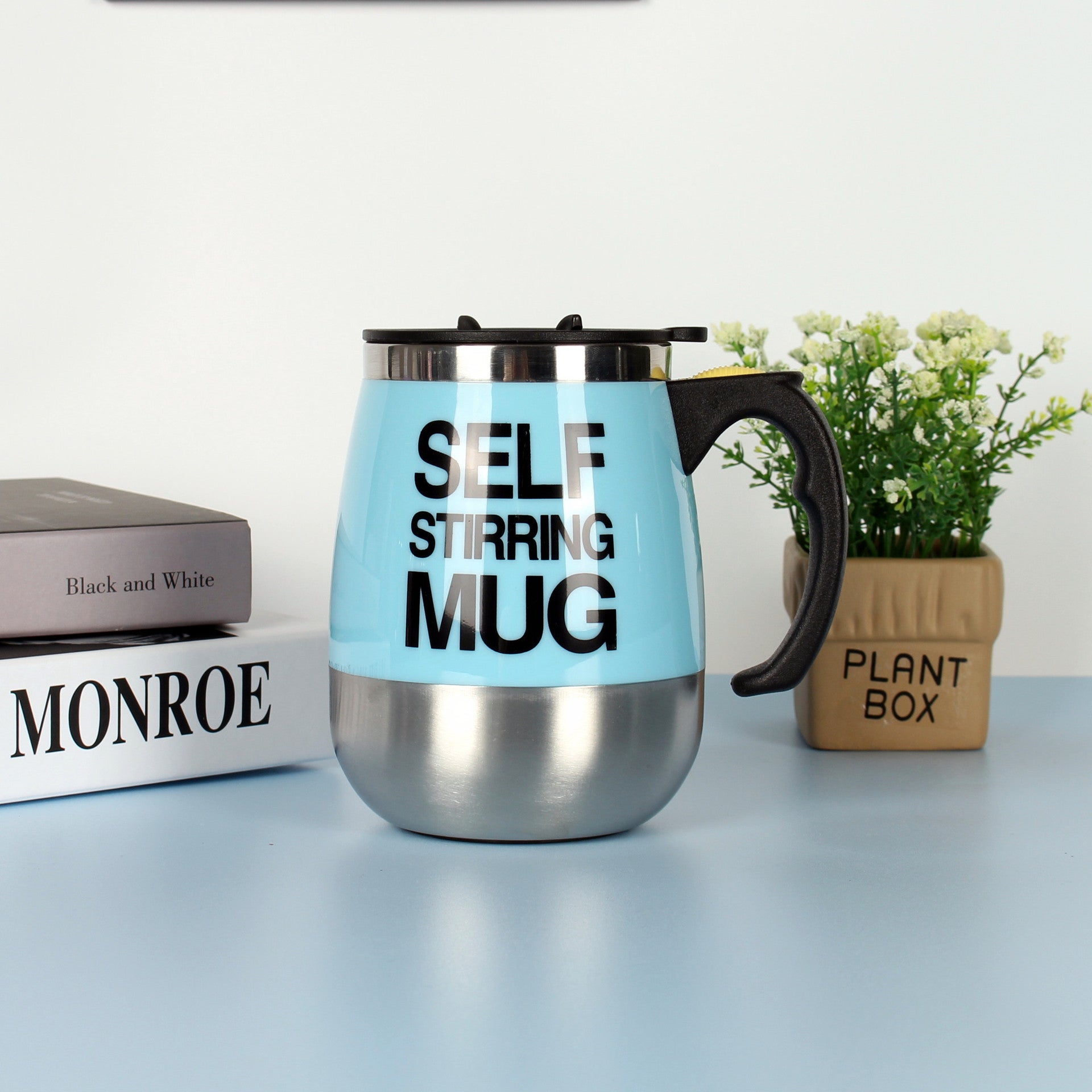 "Electric Self-Stirring Coffee Mug – A convenient, one-touch self-mixing mug with a 401-500ml capacity, available in multiple vibrant colors. Perfect for coffee, tea, and hot chocolate lovers at home or on the go."