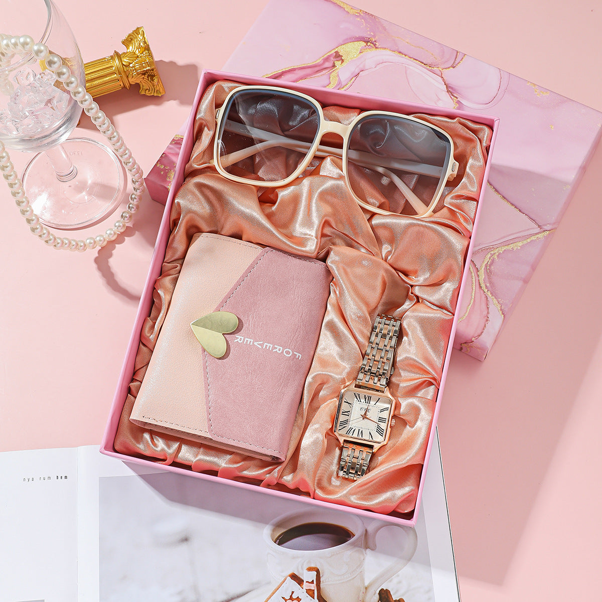 Elegant Women's Watch Business Gift Set featuring a sleek, fashion-forward design. This quartz movement timepiece is adorned with a stylish pointer and number display. The 35mm round dial with a spiral crown ensures precision, while the stainless steel needle buckle offers durability. The set includes a watch, glasses, wallet, and an elegant packaging box, making it a perfect gift choice. Available in square steel belt, pink belt, or white belt styles, this set is designed to impress, ideal for both busines