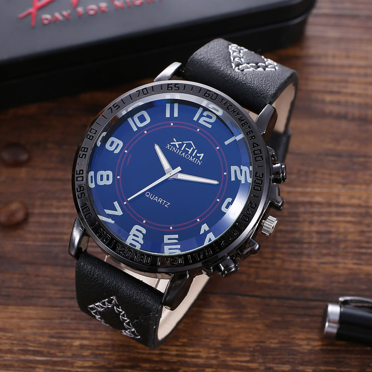 A men's fashion boutique gift set including a stylish quartz watch, belt, key chain, and glasses in a sleek packaging. Ideal for a modern, casual look.