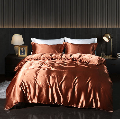 **Solid Color Double-Sided Silk Satin Bed Sheet Set – Luxurious & Soft**  

A **premium silk** **four-piece bedding set** with a **smooth satin finish**, **tassel weaving**, and **reactive dyeing** for long-lasting color. Ultra-soft, breathable, and stylish—perfect for a luxurious sleep experience. 🛏✨