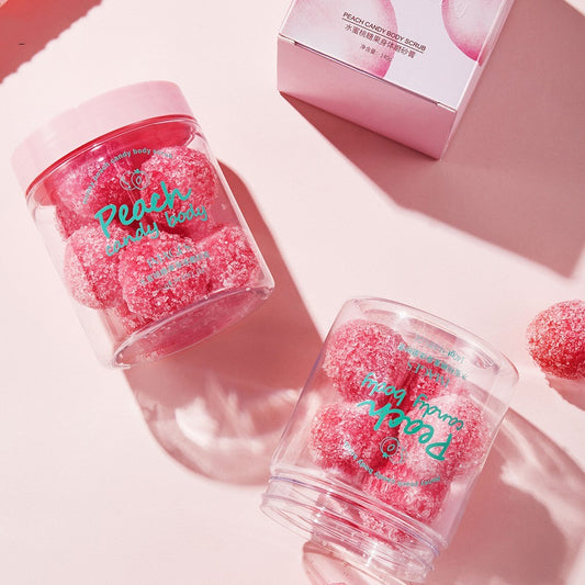 **Peach Candy Body Scrub** – A **silky, exfoliating scrub** that gently removes **dirt, oil, and dead skin** while hydrating and smoothing. With a **candy-frosted texture**, it dissolves effortlessly for a soft, radiant glow. 🍑✨ **140g per bottle.**