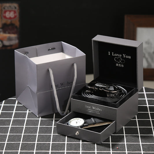 Leather Belt & Wallet Gift Box featuring a premium leather belt and either a stylish watch or wallet, all in a sleek 12 x 12 x 9 cm gift box. A perfect, elegant gift set.
