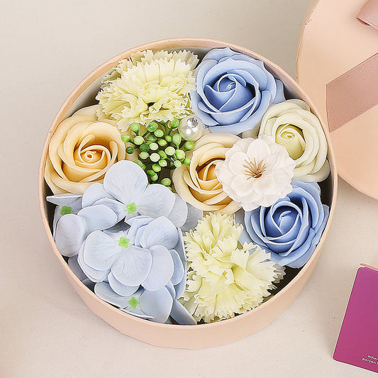 Delight your loved ones with the Soap Flower Gift Box, a beautifully handcrafted bouquet of delicate soap roses presented in a stylish gift box. Perfect for any occasion, this exquisite arrangement combines elegance with a soft, refreshing fragrance, making it a luxurious and meaningful gift.