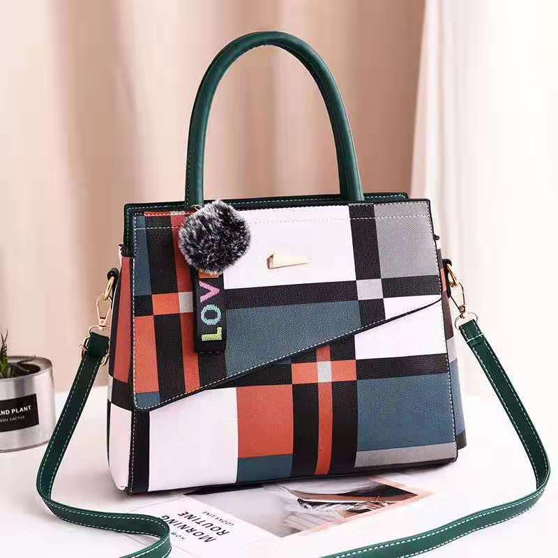 Stylish ladies one shoulder bag in two sizes (small and large), featuring a sleek design with a portable handle. Perfect for carrying essentials with a modern, elegant touch.