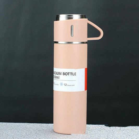 Elegant stainless steel cup set in pink gift box, featuring a 500ml vacuum-insulated cup made from 304 stainless steel inside and 201 stainless steel outside.