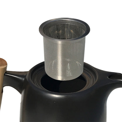 Elegant black porcelain pastoral style portable tea set, featuring an 8-piece set with a small and fresh design, perfect for outdoor tea experiences.