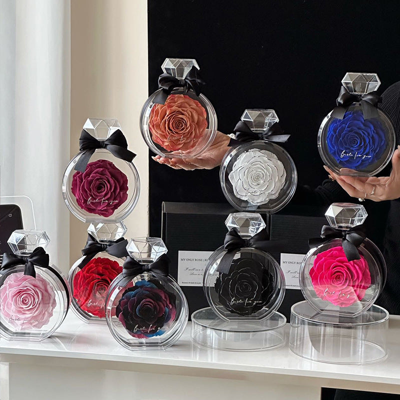 **Rose Gift Box Home Decor – Elegant & Charming 🌹** A stylish **dried flower** arrangement in a **plastic bottle**, available in colors like **Red**, **Pink**, **Sapphire Blue**, and more. Perfect for **Valentine's Day**, **Mother's Day**, and other special occasions. **10x6x14cm**. 🎁