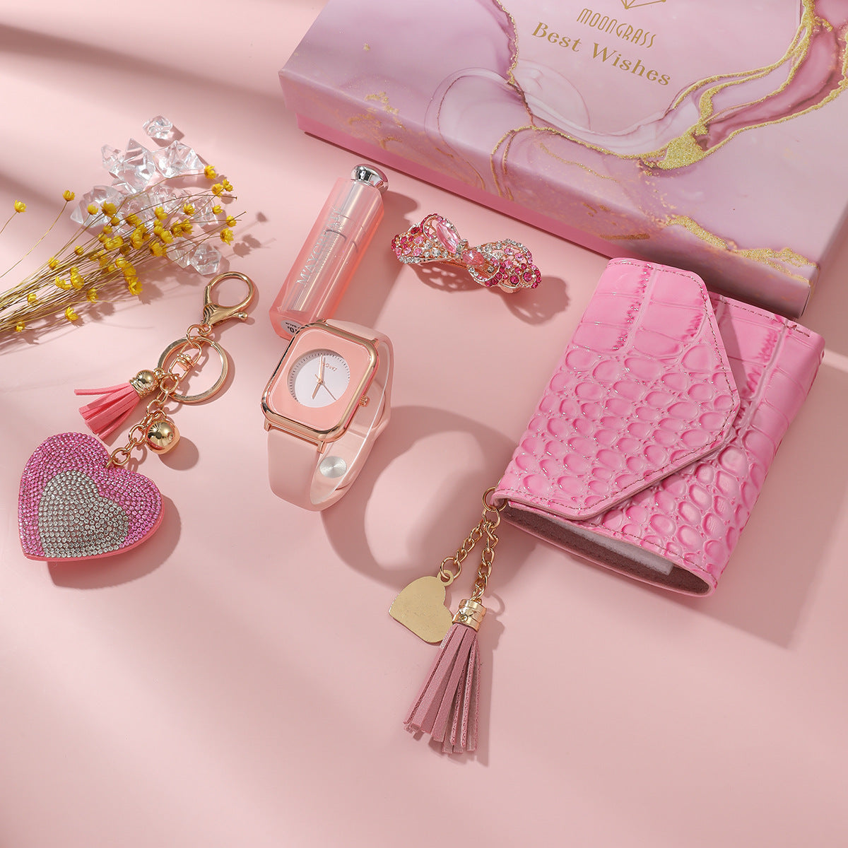 **Ladies Pink Watch Gift Set – Elegant & Functional 💖** A stylish **quartz movement** watch with **chronograph** function and **pointer display**. Available in **square belt**, **round belt**, and **square rubber** designs, featuring a **35mm dial** and **screw crown**. Includes a **wallet**, **vanity mirror**, **key chain**, and **brooch**—the perfect gift set for any occasion. 🎁