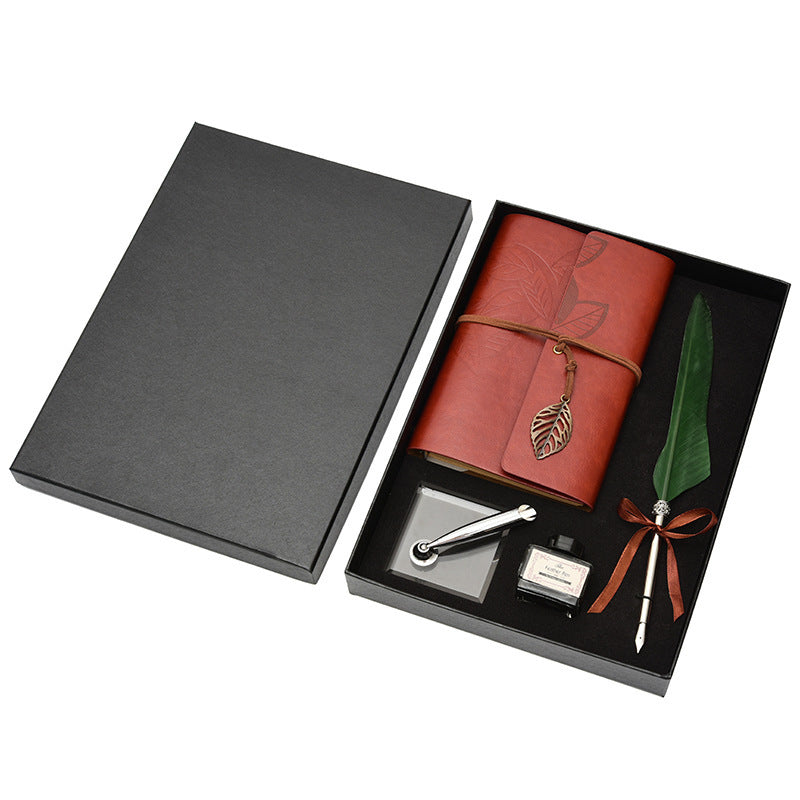 **Feather Dip Pen Gift Set – Vintage Elegance ✒️** A stunning **copper pen** with a **natural feather dip pen**, complete with **ink bottle**, **acrylic base pen insert**, and **antique book**. Box size: **25.7 x 20.7 x 5.5cm**. Perfect for writers and those who appreciate a touch of **retro charm**. ✨