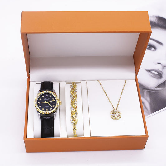 Elegant women's three-piece gift set featuring a luminous quartz watch, a necklace, and a bracelet. The set includes stylish accessories with a horseshoe buckle, alloy case, and imitation leather strap. Perfect for gifting!