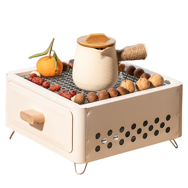 "Square Barbecue Oven-Grill – A white, alloy-constructed grill designed for 3-5 people, featuring a split-type structure, carbon fuel compatibility, and includes a charcoal plate and grill net. Perfect for outdoor gatherings and cookouts."