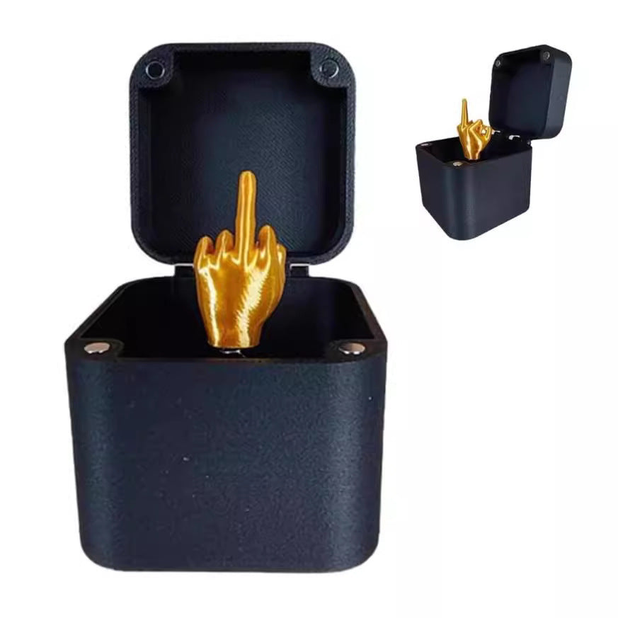 Humorous Spoof Middle Finger Surprise Gift Box with designs like middle finger, love, poop, and rose. 5cm plastic box perfect for gag gifts and pranks.