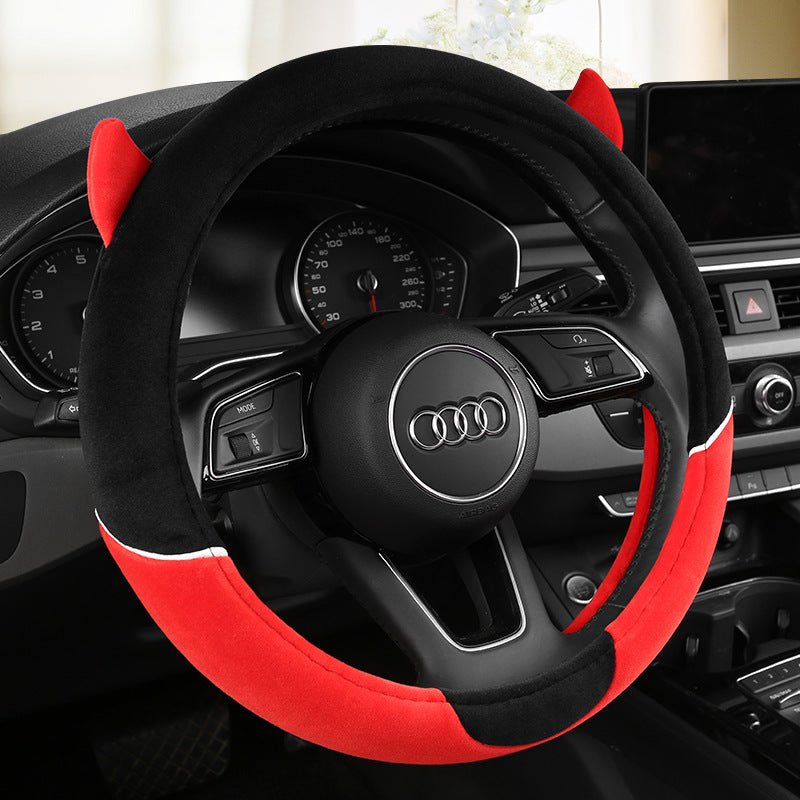 Cute cartoon plush steering wheel cover designed for all seasons, providing comfort and warmth. Fits most car models and adds a playful touch to your car's interior.