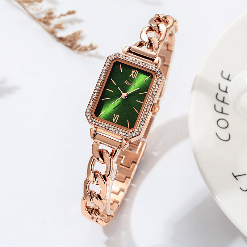 Luxury ladies watch featuring a sleek square dial with a choice of red, gold plate, starry sky black, or small green color options. The 8mm thick watch boasts a mineral reinforced glass mirror, a jewelry buckle, and a stainless steel back for durability and style.