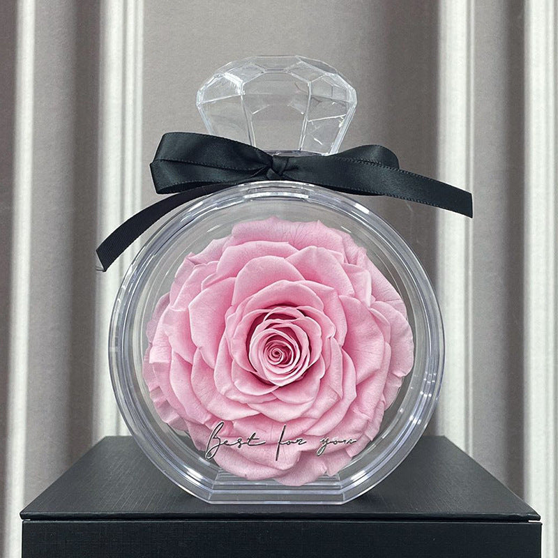 **Rose Gift Box Home Decor – Elegant & Charming 🌹** A stylish **dried flower** arrangement in a **plastic bottle**, available in colors like **Red**, **Pink**, **Sapphire Blue**, and more. Perfect for **Valentine's Day**, **Mother's Day**, and other special occasions. **10x6x14cm**. 🎁