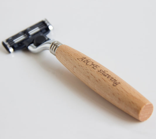 Men's shaving set featuring a metal brush and razor holder made of Fe-Ni alloy, a stainless steel double-layer shaving soap bowl, a 3-layer imported blade razor with a wooden handle, and a bristles shaving brush made from natural bristles. Available in two styles: one with a spare blade and another with two spare blades.