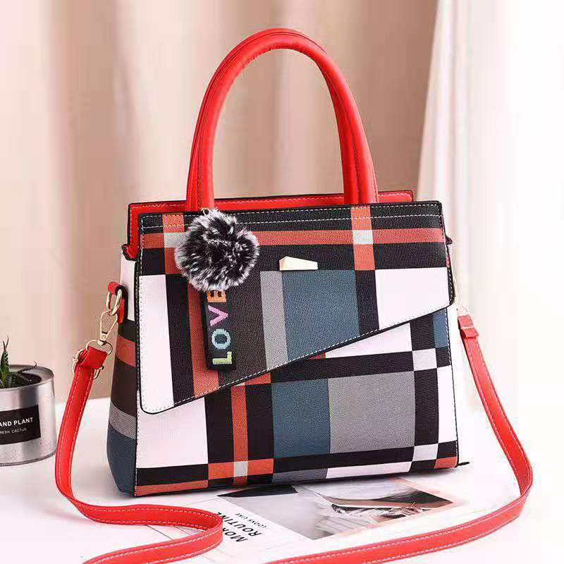 Stylish ladies one shoulder bag in two sizes (small and large), featuring a sleek design with a portable handle. Perfect for carrying essentials with a modern, elegant touch.