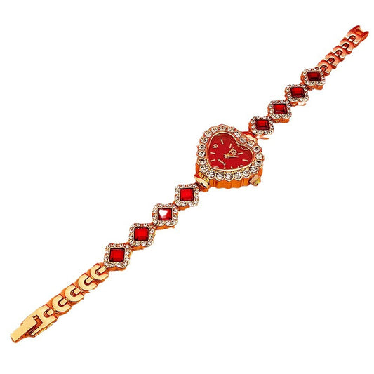 **Love Shape Watch Set – Stylish & Elegant 💖** A **quartz movement** watch with a **unique love shape design**, available in **Red**, **Green**, and **Black**. Featuring **alloy strap** and **stainless steel** watch bottom for durability. A versatile piece, worn as both a **watch** and **bracelet**. ✨