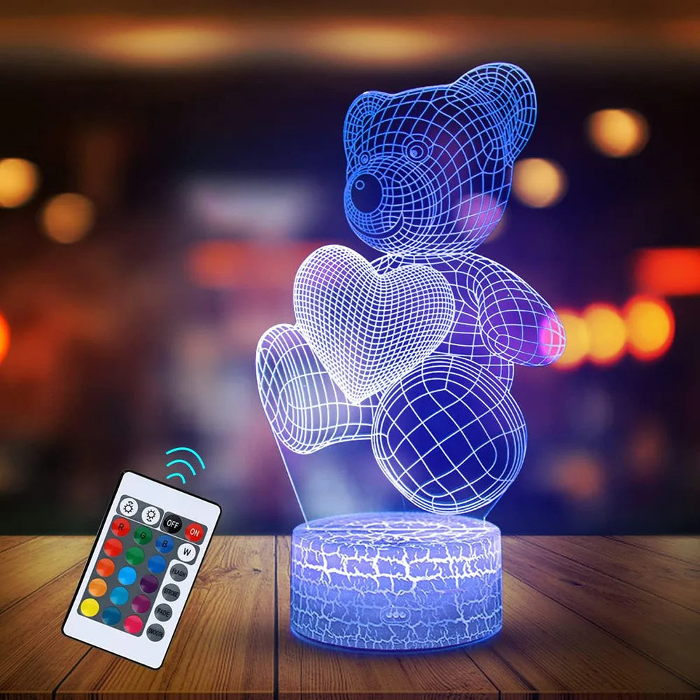 
3D Teddy Bear LED Night Light with 16 color options, touch and remote control, made from acrylic material. Powered by USB or batteries, perfect for kids' room decor.