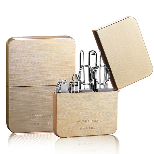 Nail clippers set made of carbon steel, including a diagonal cut clipper, flat cut clipper, dead skin shovel, nail file, eyebrow clip, ear pick, and eyebrow scissors for complete grooming.