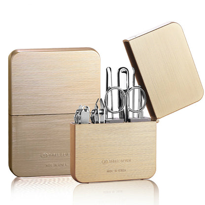 Nail clippers set made of carbon steel, including a diagonal cut clipper, flat cut clipper, dead skin shovel, nail file, eyebrow clip, ear pick, and eyebrow scissors for complete grooming.