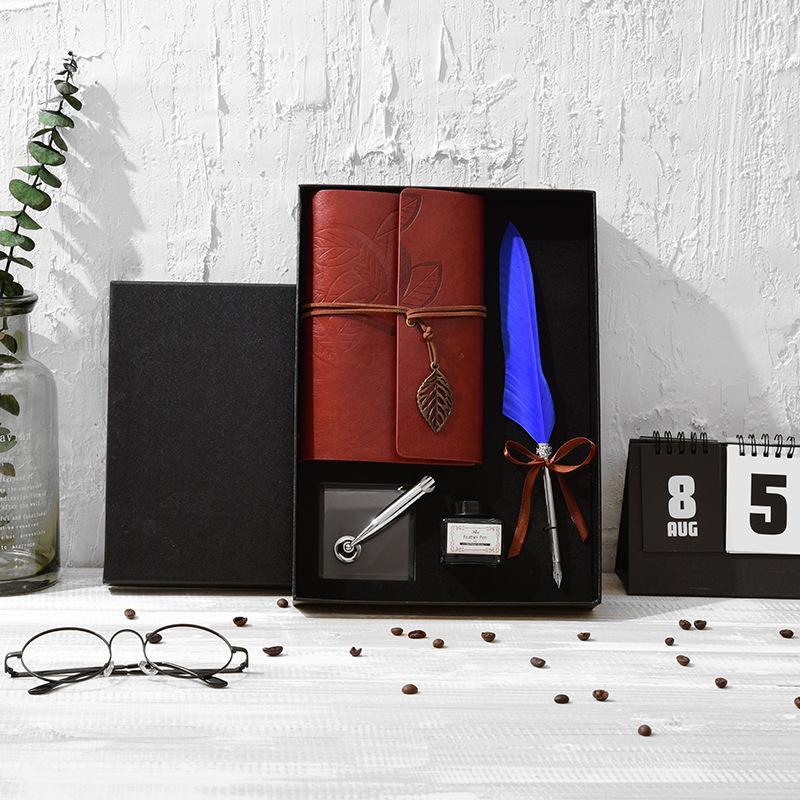 **Feather Dip Pen Gift Set – Vintage Elegance ✒️** A stunning **copper pen** with a **natural feather dip pen**, complete with **ink bottle**, **acrylic base pen insert**, and **antique book**. Box size: **25.7 x 20.7 x 5.5cm**. Perfect for writers and those who appreciate a touch of **retro charm**. ✨