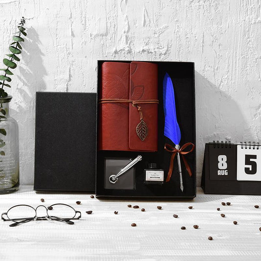 **Feather Dip Pen Gift Set – Vintage Elegance ✒️** A stunning **copper pen** with a **natural feather dip pen**, complete with **ink bottle**, **acrylic base pen insert**, and **antique book**. Box size: **25.7 x 20.7 x 5.5cm**. Perfect for writers and those who appreciate a touch of **retro charm**. ✨