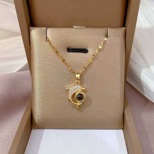 Exquisite dolphin stone necklace, featuring a unique and elegant design. Perfect for adding exotic charm to any outfit.