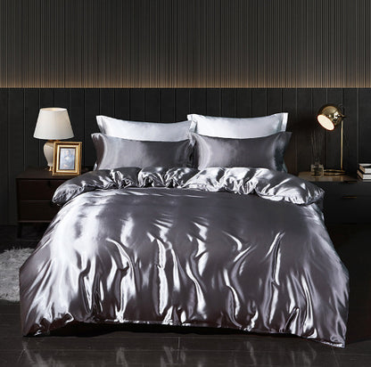 **Solid Color Double-Sided Silk Satin Bed Sheet Set – Luxurious & Soft**  

A **premium silk** **four-piece bedding set** with a **smooth satin finish**, **tassel weaving**, and **reactive dyeing** for long-lasting color. Ultra-soft, breathable, and stylish—perfect for a luxurious sleep experience. 🛏✨