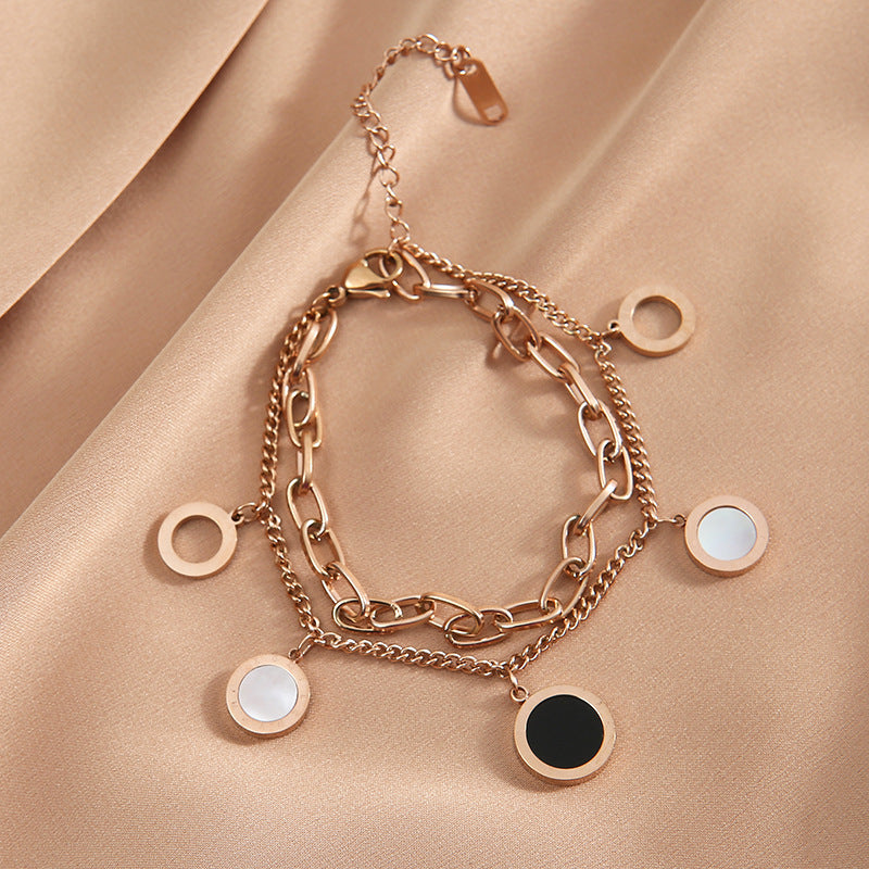 Golden Essence Roman numeral pendant bracelet, adding a touch of light luxury and timeless elegance to any outfit. #RomanNumeralBracelet #LightLuxury #GoldenEssence #TimelessElegance #FashionJewelry #LuxuryAccessories #PendantBracelet #ChicStyle