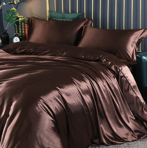 **Solid Color Double-Sided Silk Satin Bed Sheet Set – Luxurious & Soft**  

A **premium silk** **four-piece bedding set** with a **smooth satin finish**, **tassel weaving**, and **reactive dyeing** for long-lasting color. Ultra-soft, breathable, and stylish—perfect for a luxurious sleep experience. 🛏✨