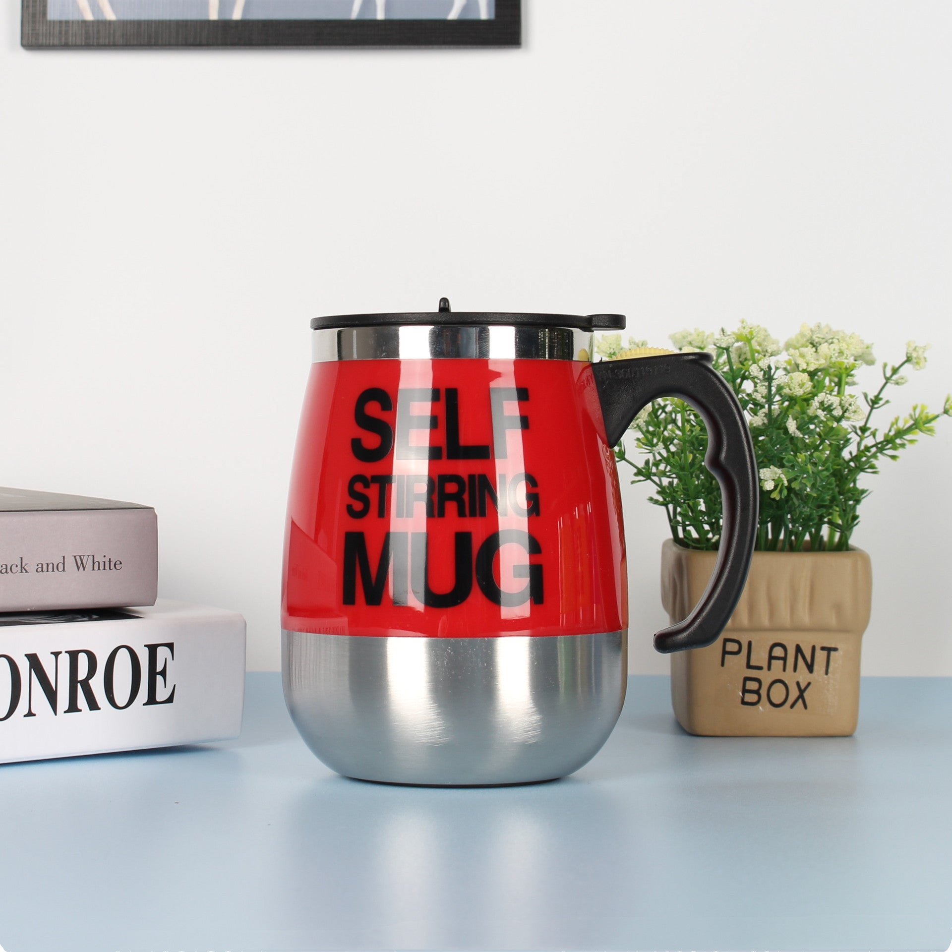"Electric Self-Stirring Coffee Mug – A convenient, one-touch self-mixing mug with a 401-500ml capacity, available in multiple vibrant colors. Perfect for coffee, tea, and hot chocolate lovers at home or on the go."