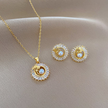 Diamond Leaves Jewelry Set – Elegant geometric necklace and earrings set featuring titanium steel and copper, with electroplating for durability and a sophisticated design.