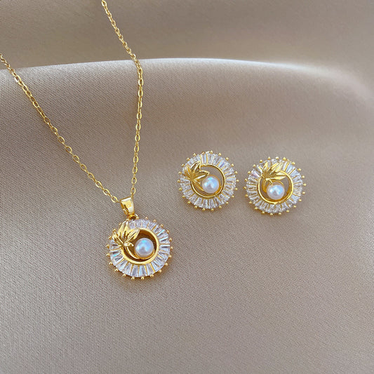 Diamond Leaves Jewelry Set – Elegant geometric necklace and earrings set featuring titanium steel and copper, with electroplating for durability and a sophisticated design.