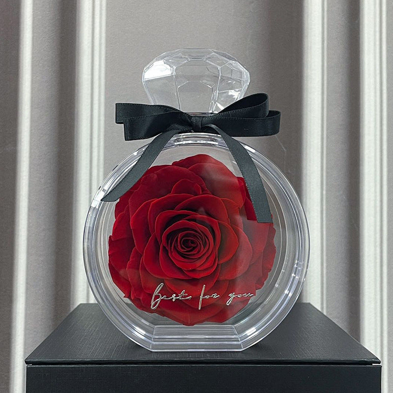 **Rose Gift Box Home Decor – Elegant & Charming 🌹** A stylish **dried flower** arrangement in a **plastic bottle**, available in colors like **Red**, **Pink**, **Sapphire Blue**, and more. Perfect for **Valentine's Day**, **Mother's Day**, and other special occasions. **10x6x14cm**. 🎁