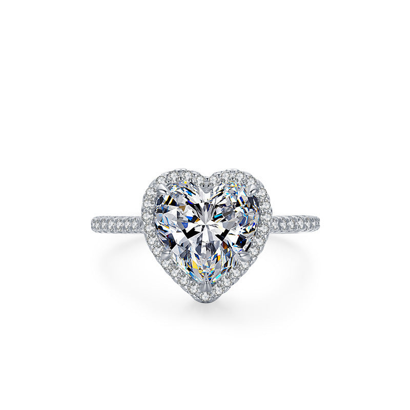 Elegant heart-shaped silver ring with inlaid zircon, featuring a luxurious design. Available in multiple sizes, perfect for women who love timeless and romantic jewelry.