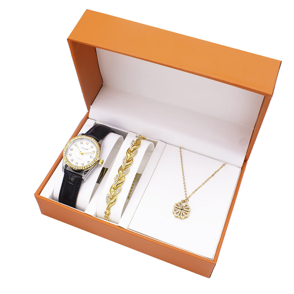 Elegant women's three-piece gift set featuring a luminous quartz watch, a necklace, and a bracelet. The set includes stylish accessories with a horseshoe buckle, alloy case, and imitation leather strap. Perfect for gifting!