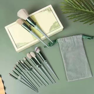 A 13-piece makeup brush set featuring soft synthetic bristles, durable plastic handles, and aluminum ferrules. The set includes brushes for foundation, powder, blush, highlighter, eyeshadow, lip, eyebrow, concealer, and blending. Available in various packaging options such as cloth bags and boxes in green, pink, and yellow. Ideal for professional and personal use, providing precise application and easy cleaning.