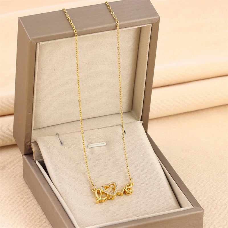 **Love Necklace – Stylish & Personal 💖** A **titanium steel** necklace with a **unique design**, featuring **letters**, **numbers**, or **text** for a personal touch. Crafted with **electroplating** for a sleek finish. Perfect for adding elegance to any outfit. ✨