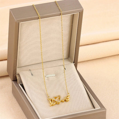 **Love Necklace – Stylish & Personal 💖** A **titanium steel** necklace with a **unique design**, featuring **letters**, **numbers**, or **text** for a personal touch. Crafted with **electroplating** for a sleek finish. Perfect for adding elegance to any outfit. ✨